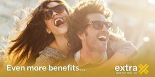 Extra Gold Even More Benefits banner with a couple enjoy the savings!